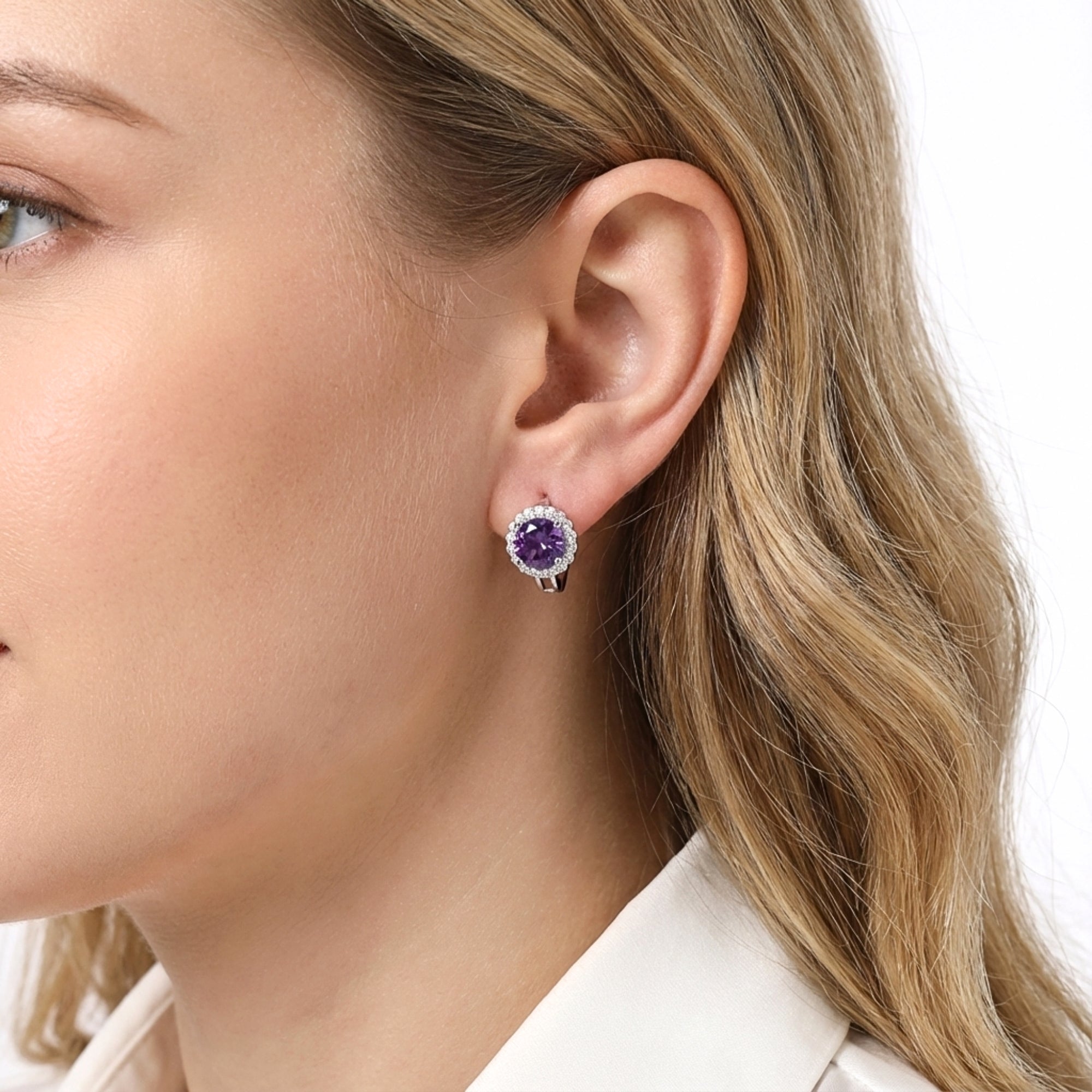 Model wearing a round cut purple moissanite halo earring in S925 sterling silver.