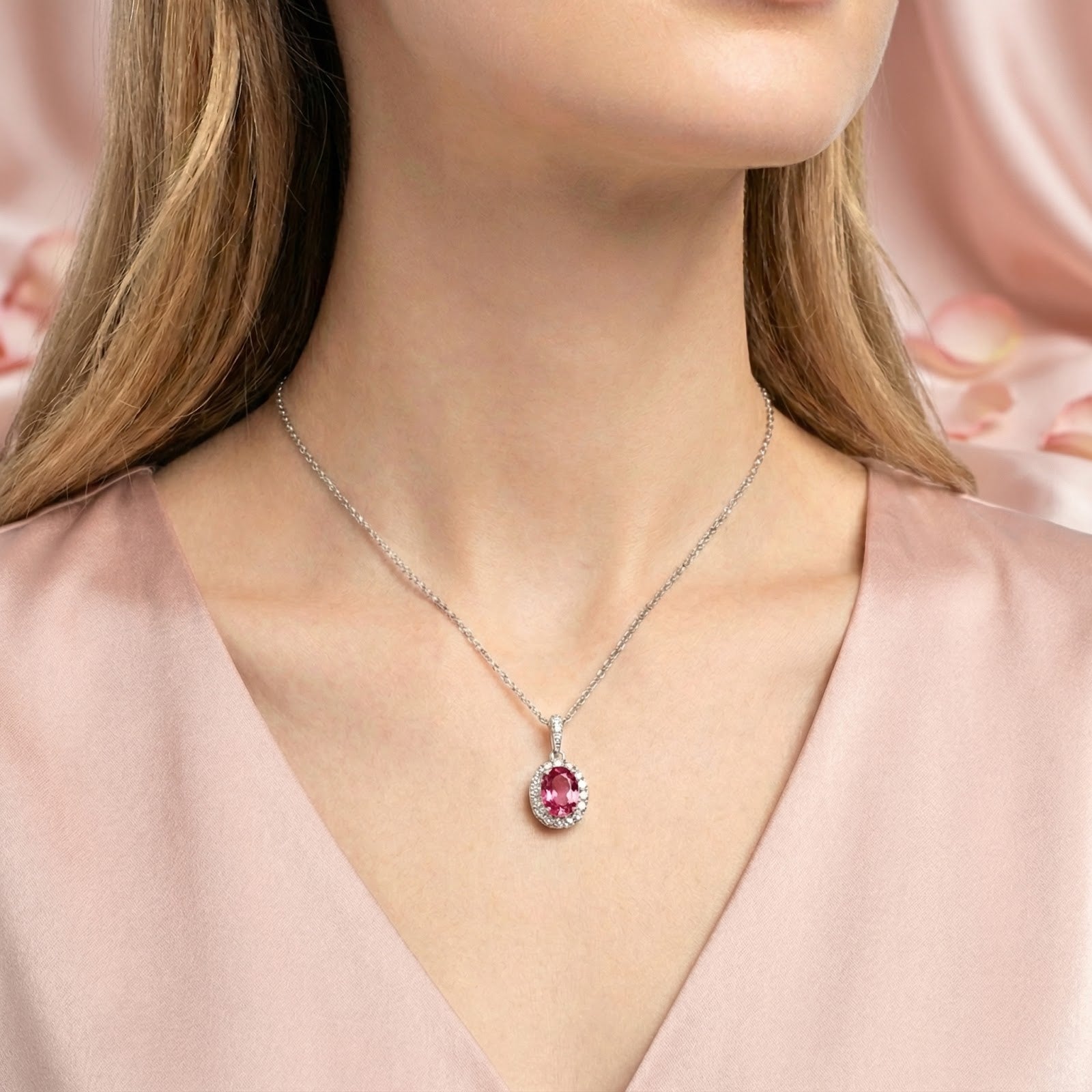 Model wearing the Octavia halo pendant featuring a vivid pink tourmaline and S925 silver chain.