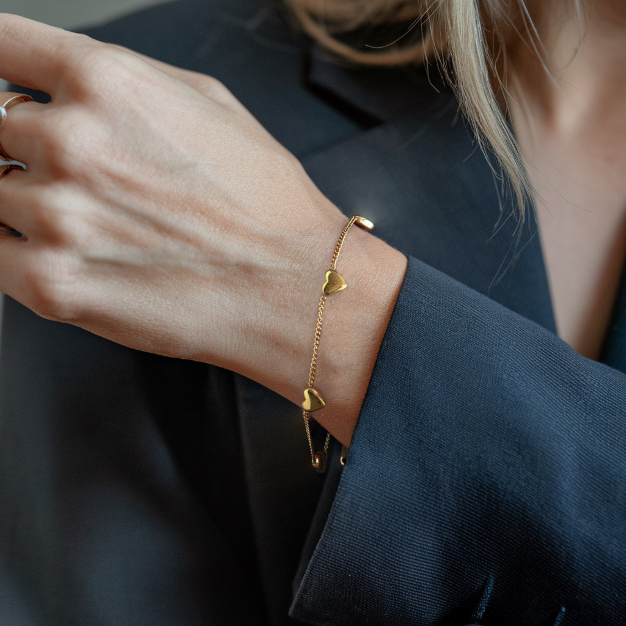 Bracelet Lien Quatre Breloques Coeur