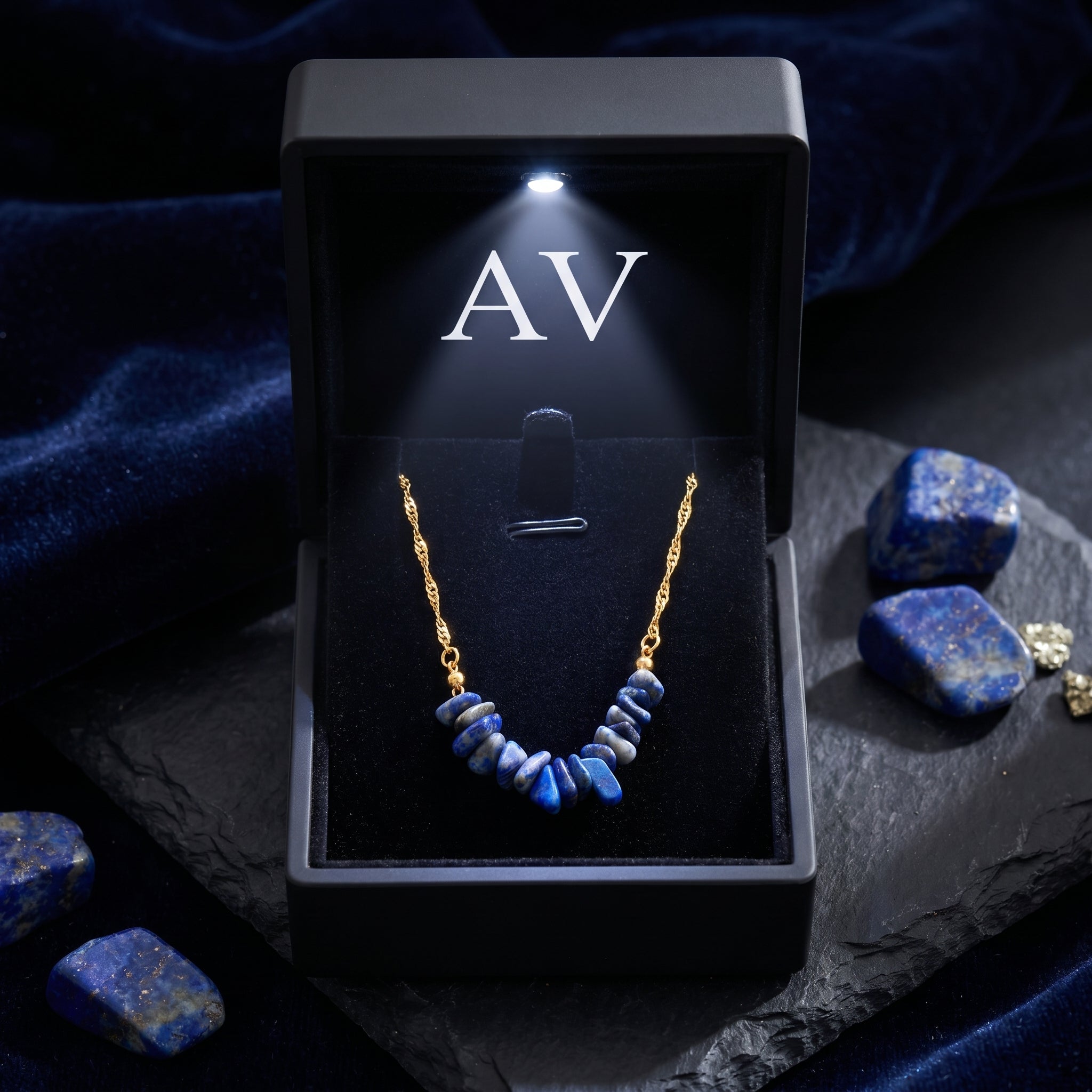 Natural lapis lazuli necklace in a premium black LED-lit jewelry gift box with AV branding.