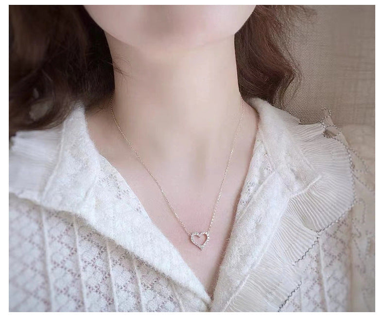 Pendentif cœur pavé de diamants