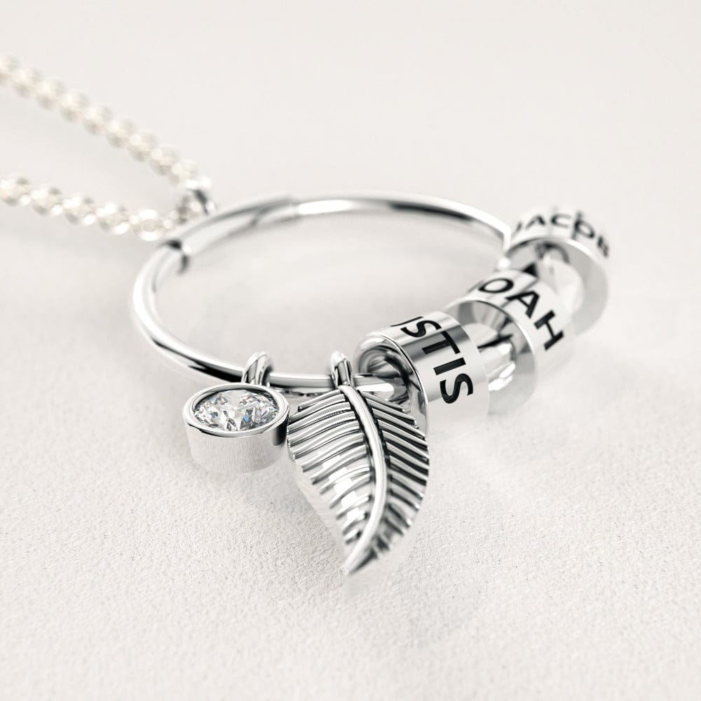 Collier personnalisé avec pendentif cercle perlé et motif feuille