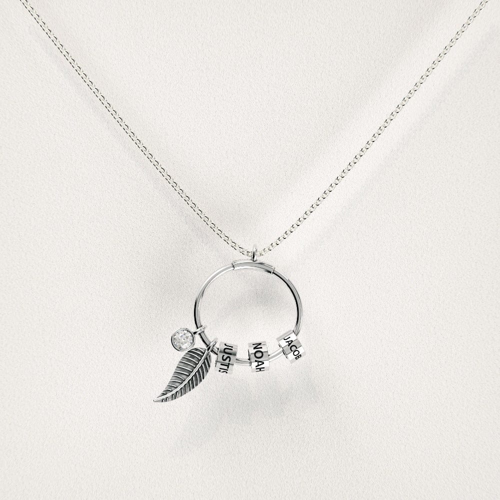Collier personnalisé avec pendentif cercle perlé et motif feuille