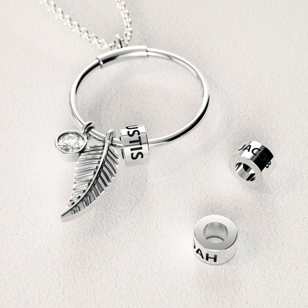 Collier personnalisé avec pendentif cercle perlé et motif feuille