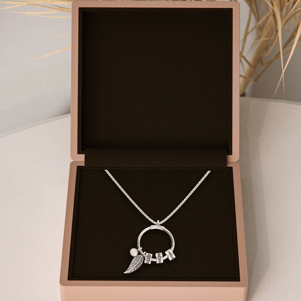 Collier personnalisé avec pendentif cercle perlé et motif feuille
