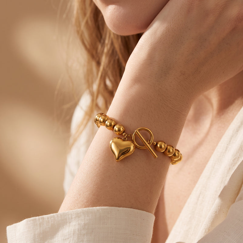 De kralenarmband met hart en toggle