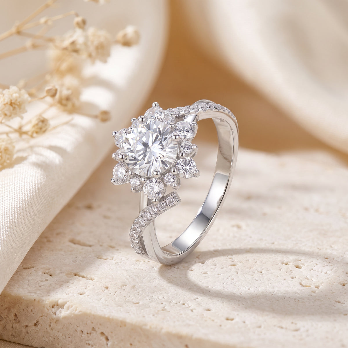 Angled view of the silver halo ring showcasing the raised central cluster setting and smooth inner band.