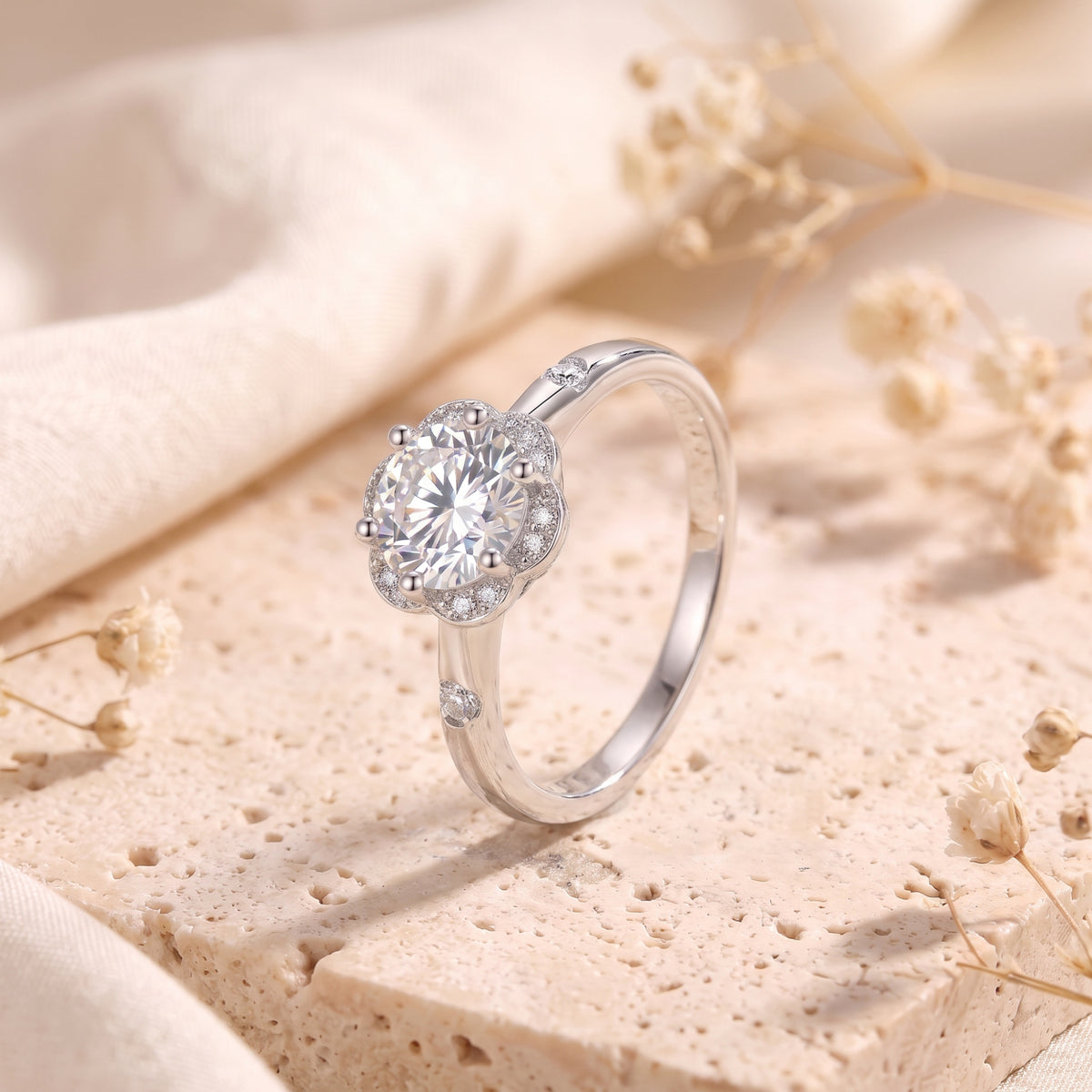 Angled view of the S925 silver Fleur Bloom ring with round-cut center stone.