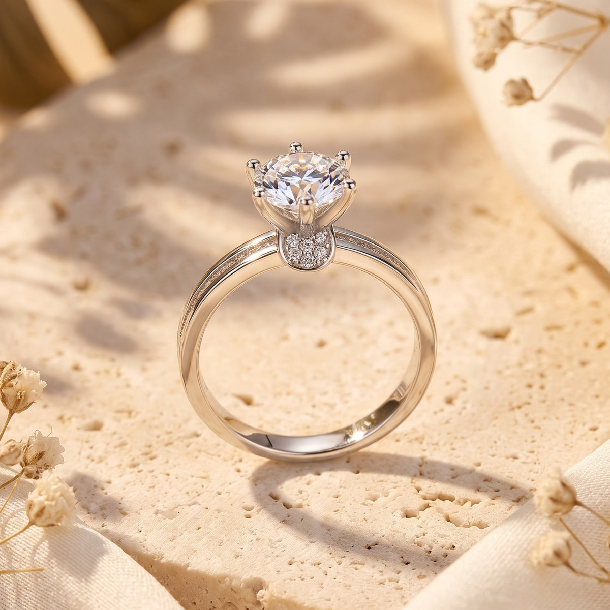 Side view of the S925 sterling silver solitaire ring and round brilliant stone.