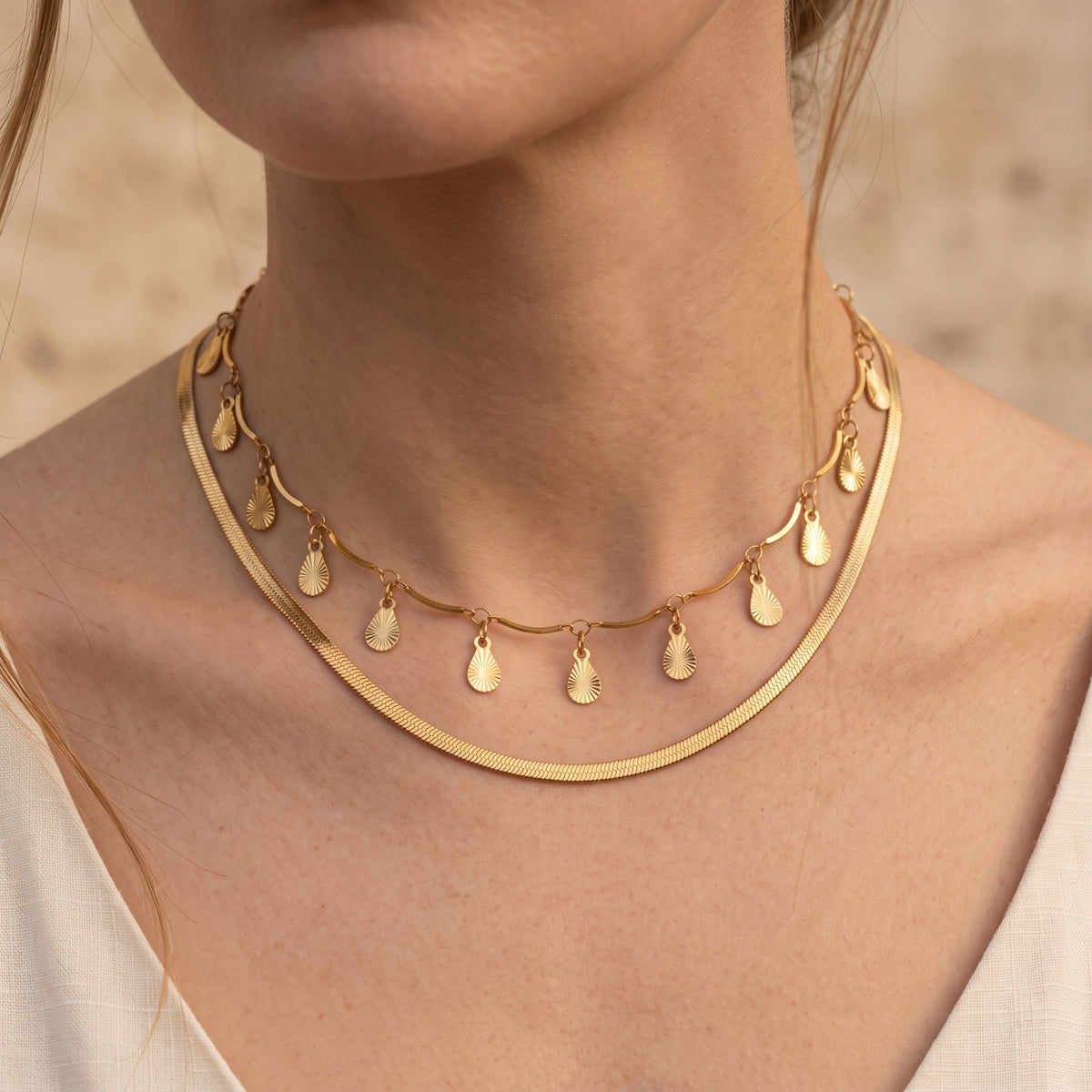 De stralende druppelvormige ketting
