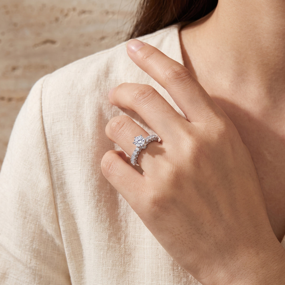 Model wearing the silver Regal Cathedral ring with a round-cut center stone.