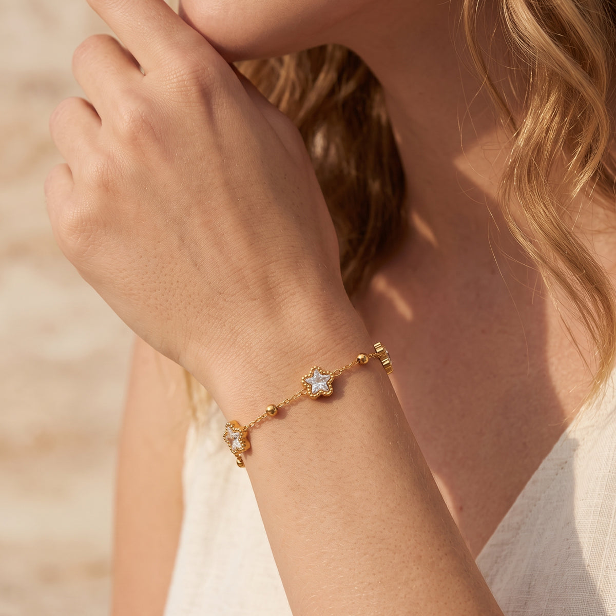 De sterrenarmband met hemelse bedels