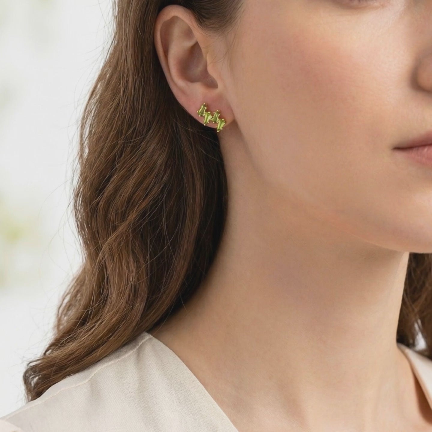 Zephyraea Vine earrings in solid gold with simulated peridot.