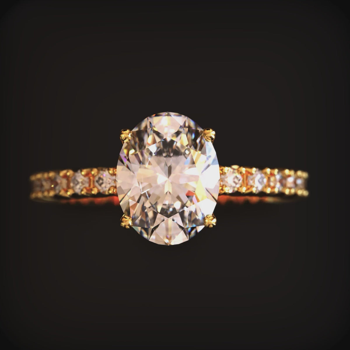 A video of the Amorette 14K solid gold ring with oval moissanite.
