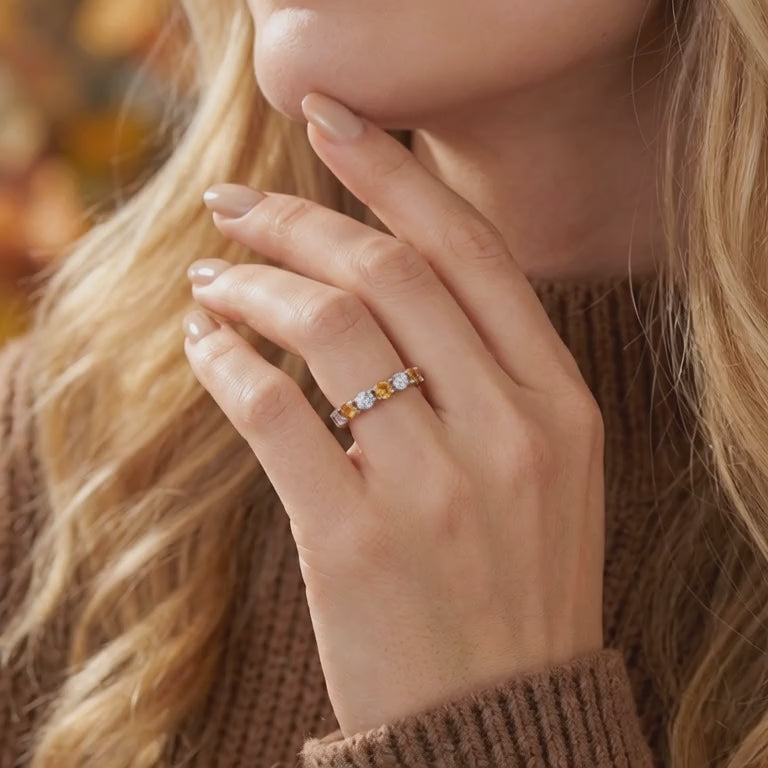 Video of the Novara solid gold ring with simulated topaz.