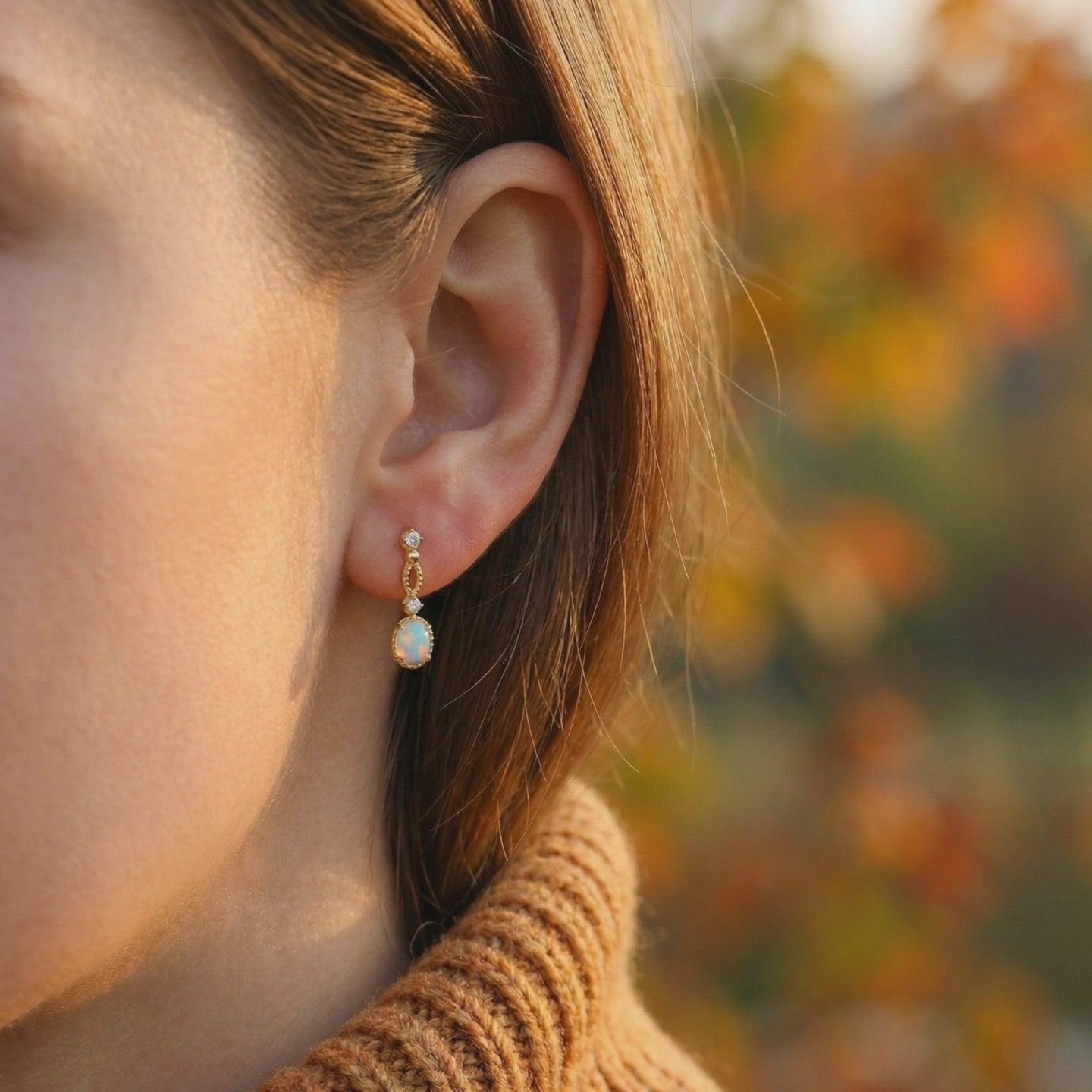 Lorelei Oval Opal drop earrings in solid gold.