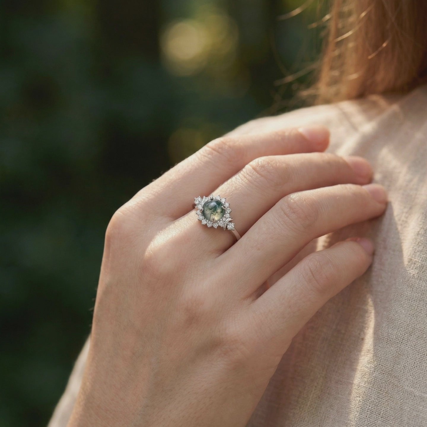 Natural moss agate floral halo ring in solid white gold.