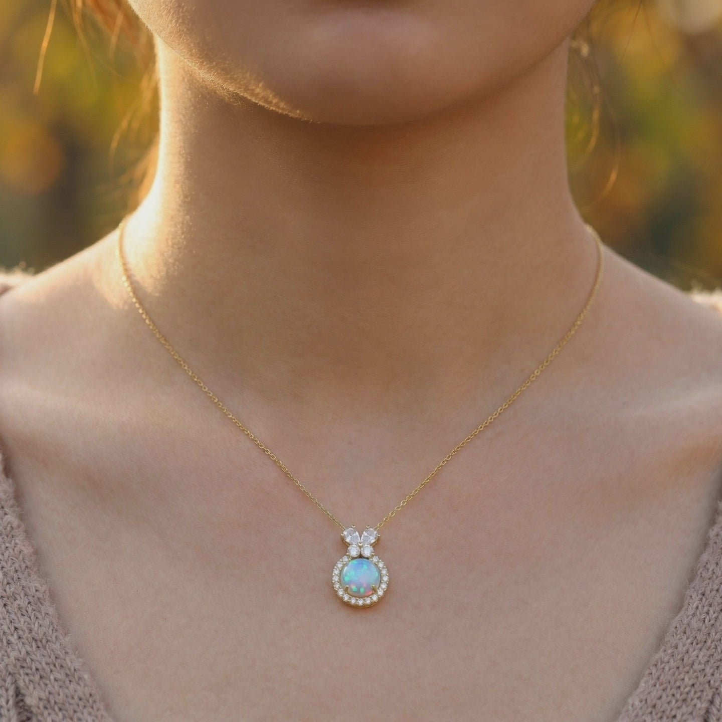 The Orianne natural opal solid gold necklace.