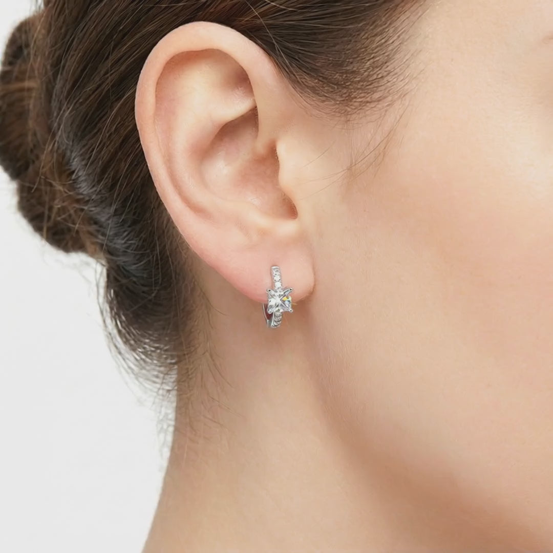 Princess-cut simulated diamond huggie earrings crafted in solid gold.