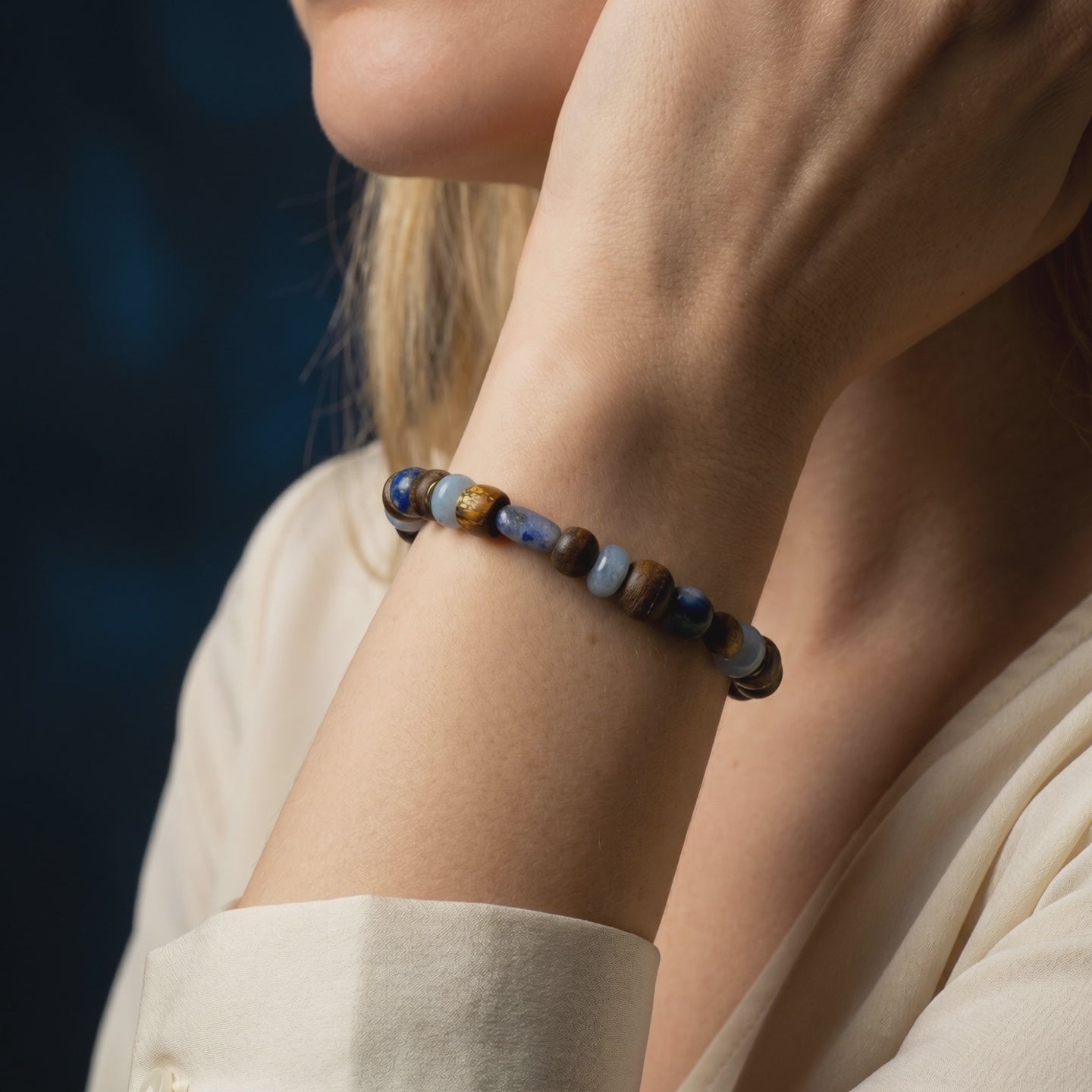 A solid gold Lapis Lazuli bead bracelet.