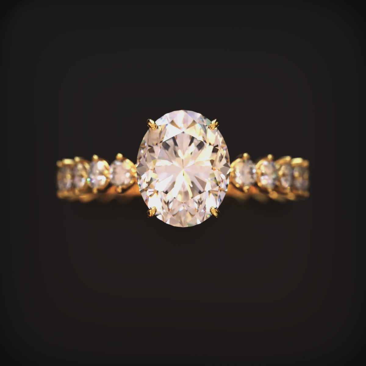 A ring with a 2 carat oval moissanite center stone and solid gold band.