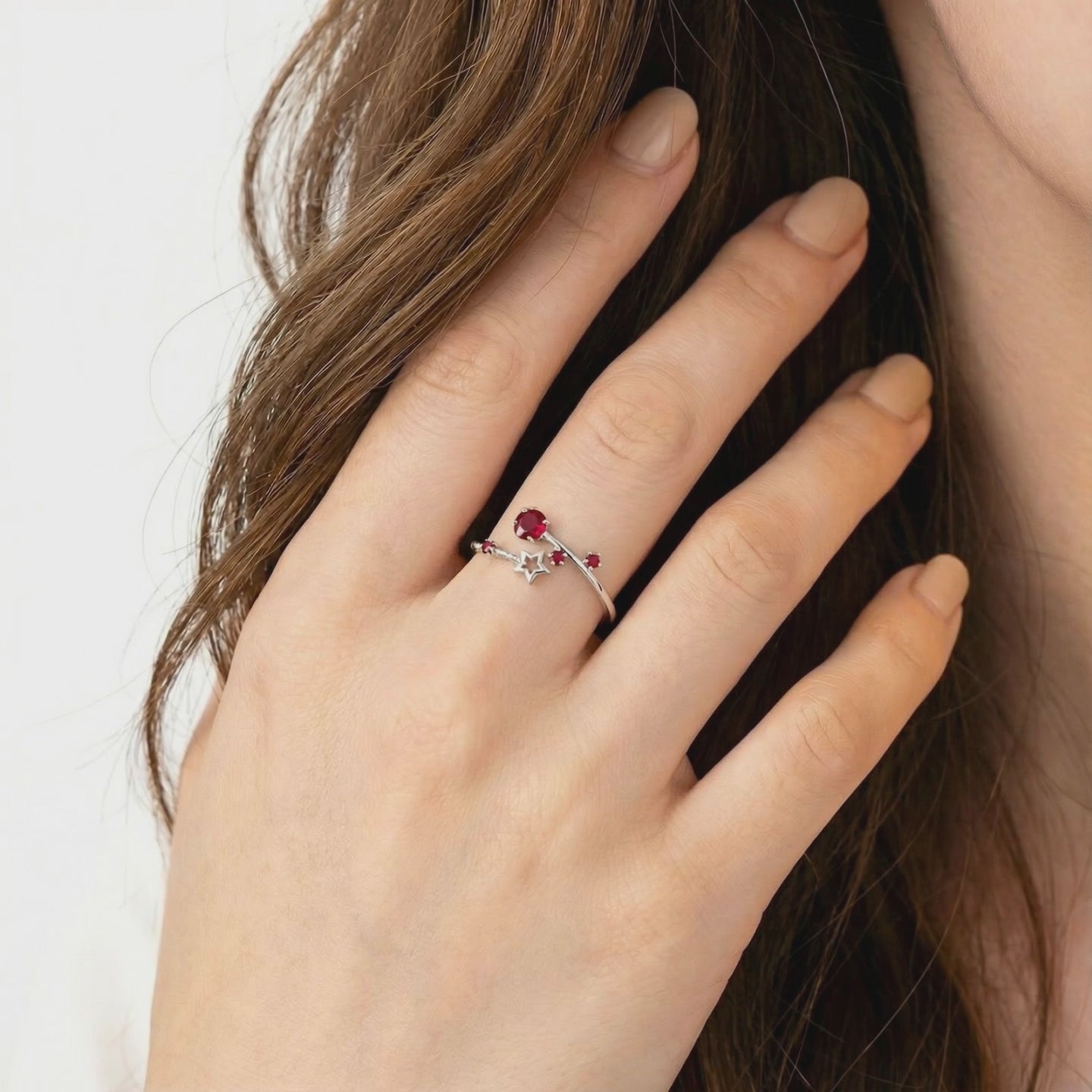 Lyriana Star solid gold ring with simulated ruby.