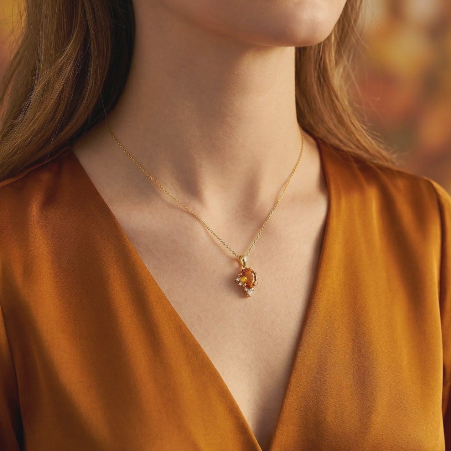 Video of the pear-cut Simulated Topaz solid gold necklace.