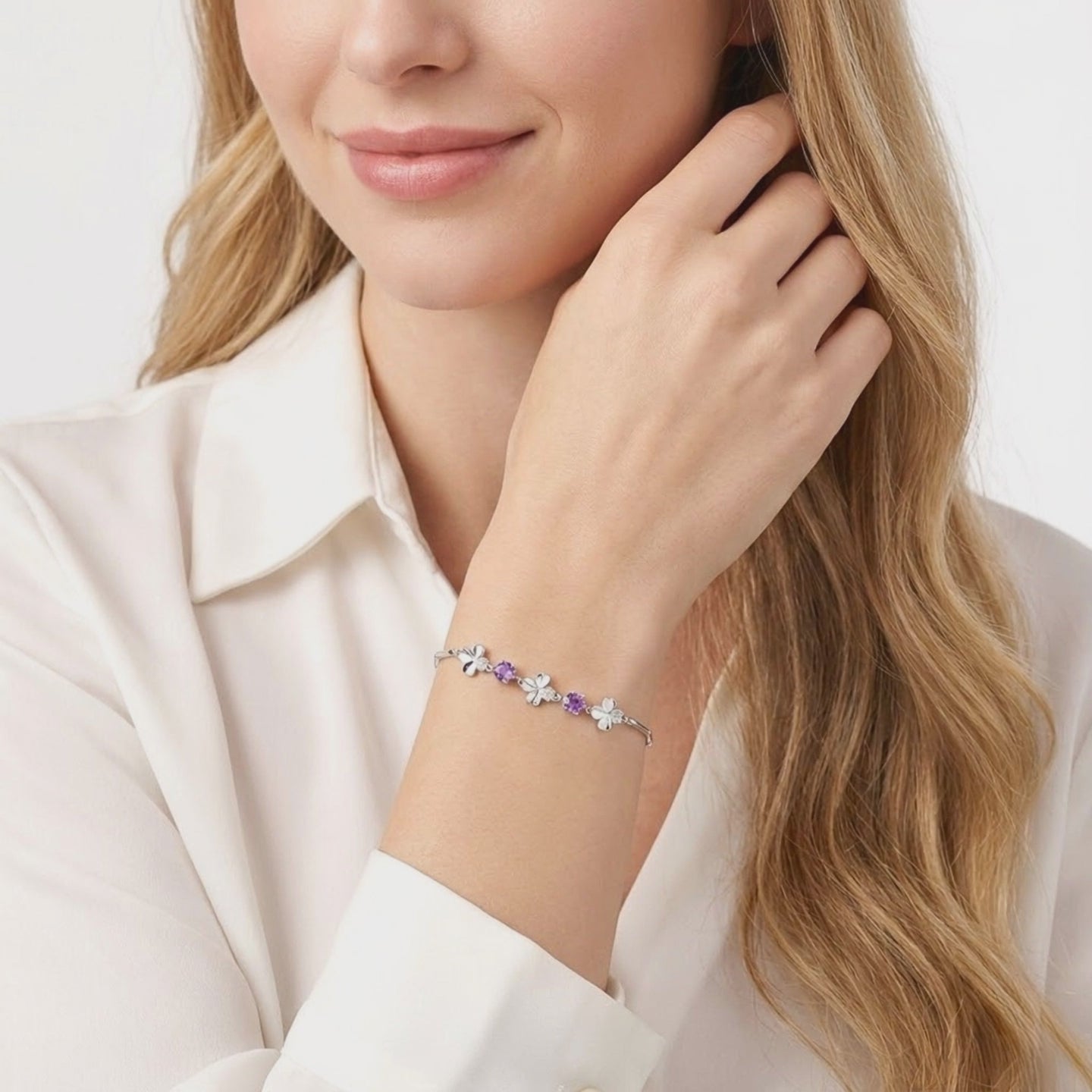 Solid gold bracelet with simulated amethyst stones.