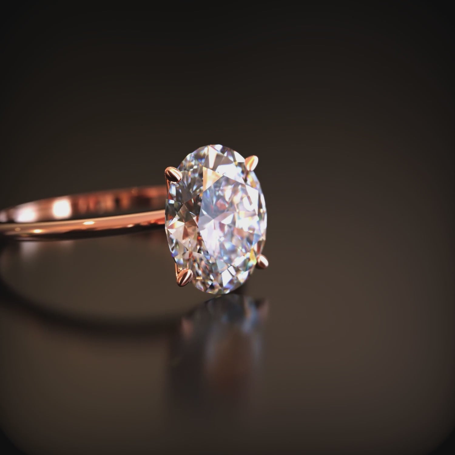 The Bella oval moissanite solitaire ring in 14K solid gold.
