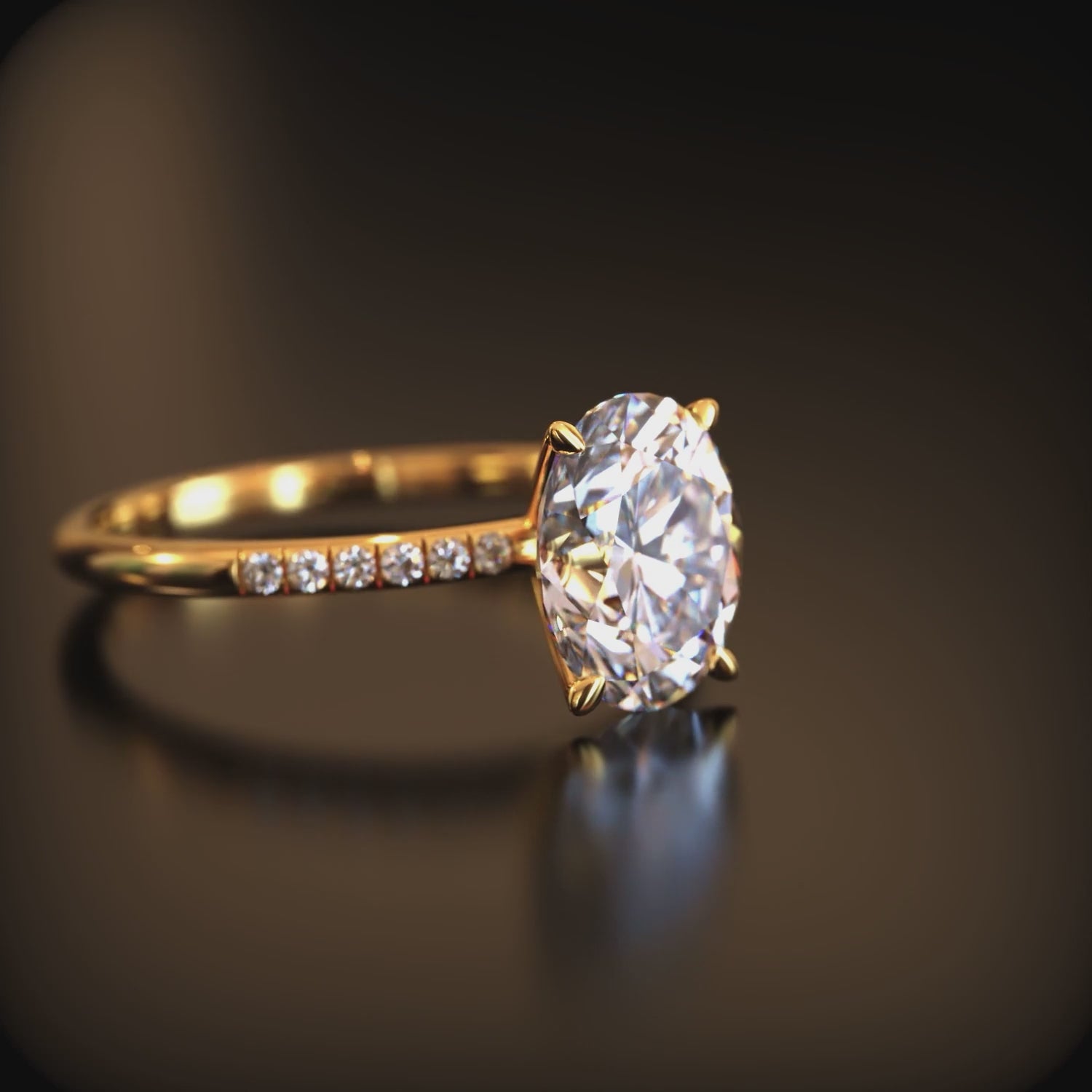 An oval moissanite solid gold ring.