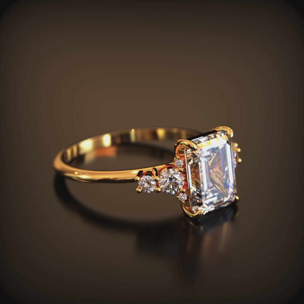 The Bella Jewel 3 carat emerald-cut moissanite ring in solid gold.