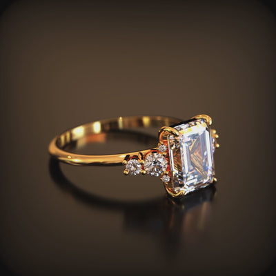 The Bella Jewel 3 carat emerald-cut moissanite ring in solid gold.