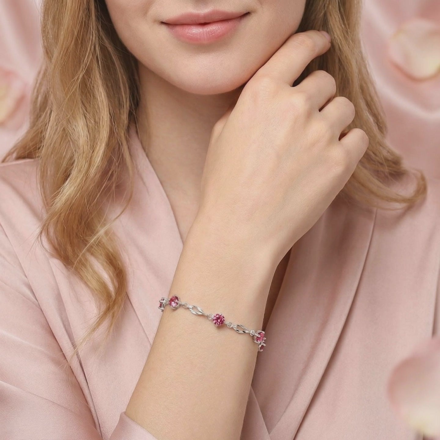Solid gold bracelet with simulated pink tourmaline stones.
