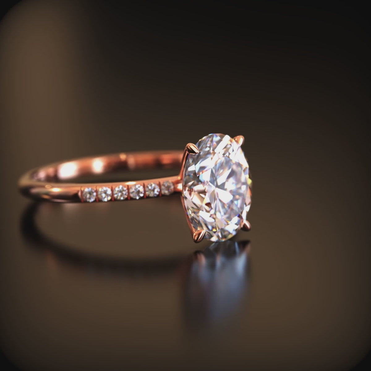An oval moissanite solid gold ring.