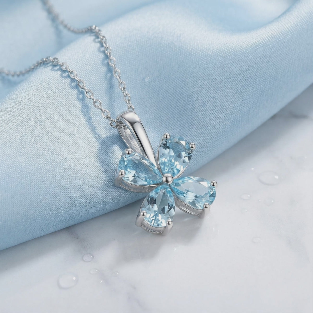 Video of a solid gold necklace with simulated aquamarines.