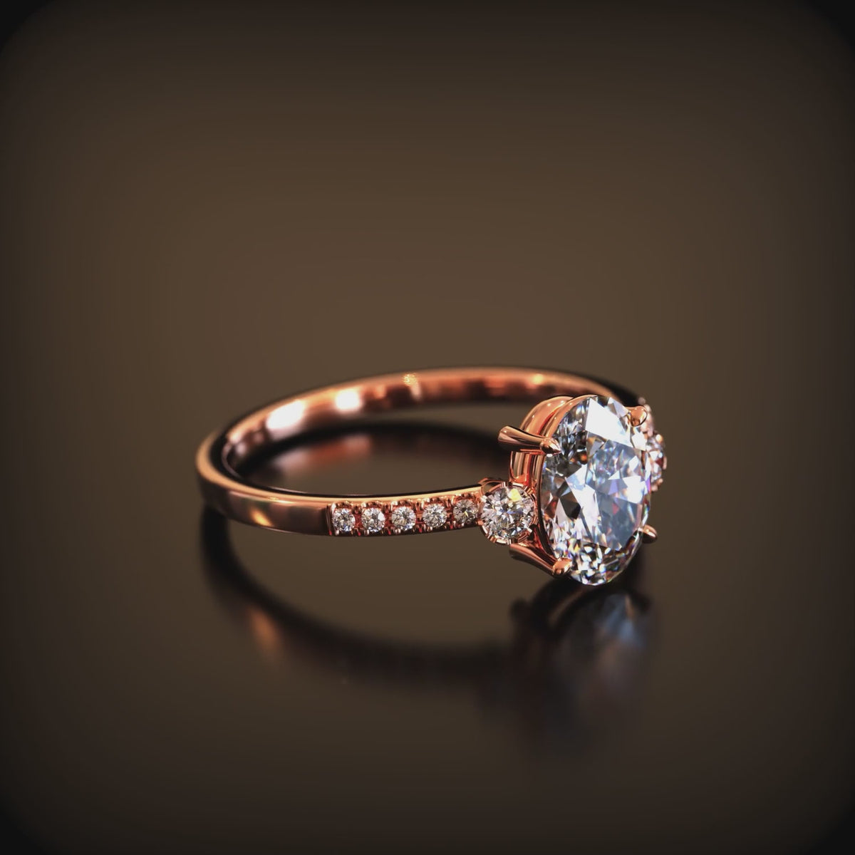 A 2 carat oval moissanite ring crafted in solid gold with a simulated diamond eternity band.