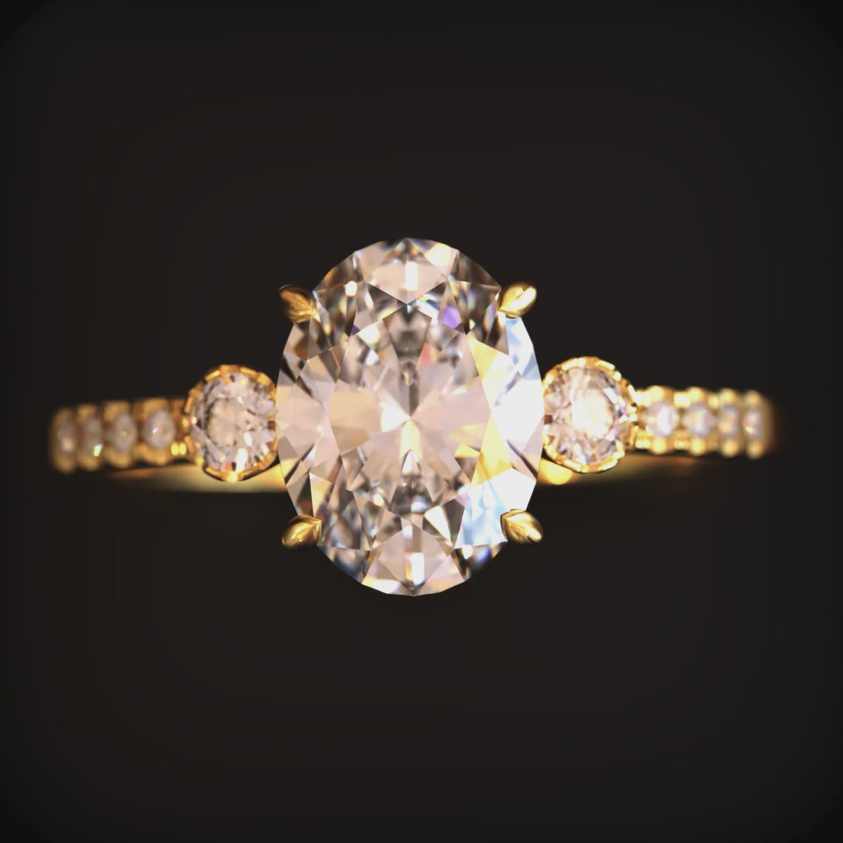 A 2 carat oval moissanite ring crafted in solid gold with a simulated diamond eternity band.