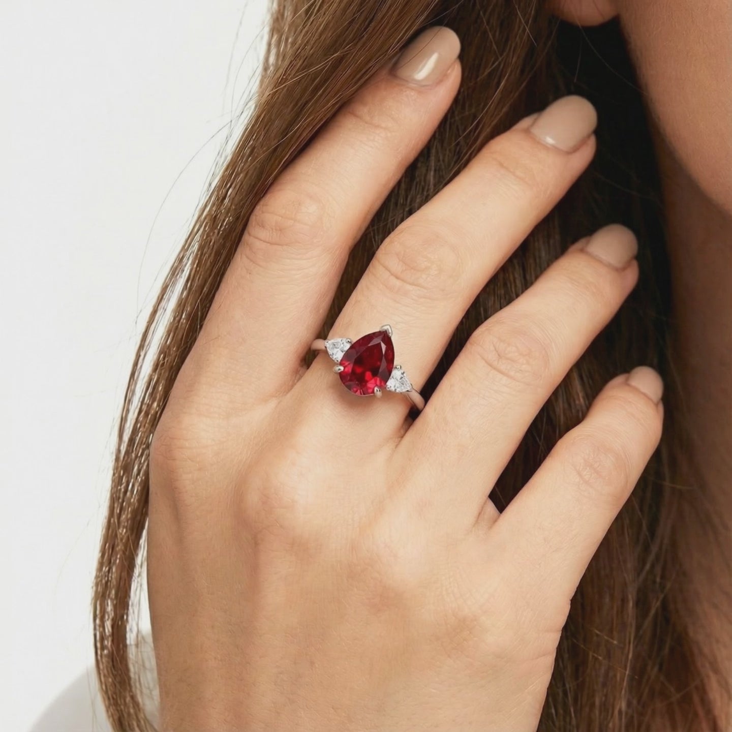The Rosalyne Pear simulated ruby ring in solid gold.