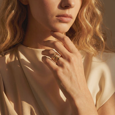 Video of The Marinella Ring, a solid gold ring with an organic fluid design.