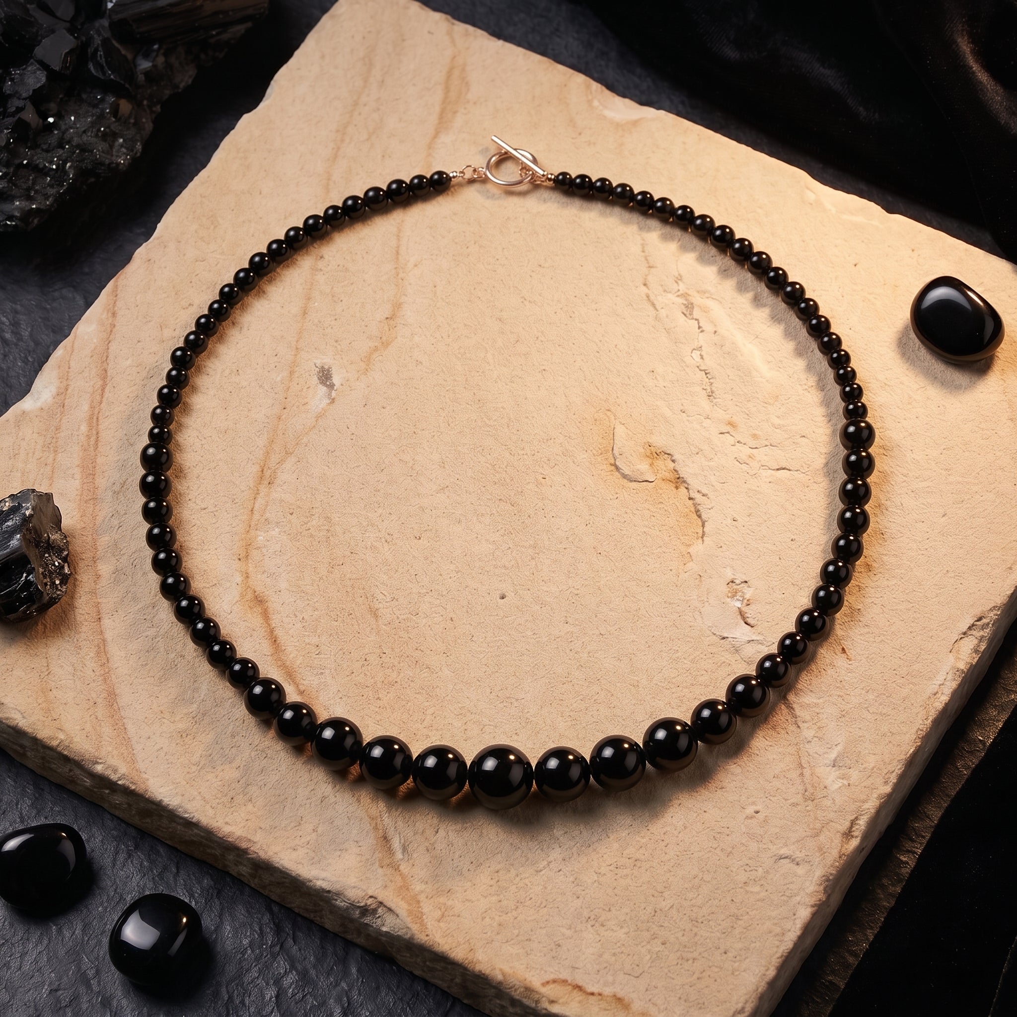 the-penumbra-graduated-natural-onyx-necklace in rose gold finish